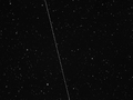 Fotografia fragmentu nieba ze śladem planetoidy 2004 BL86 (fot. John Talbot). Źródło: http://spaceweathergallery.com .